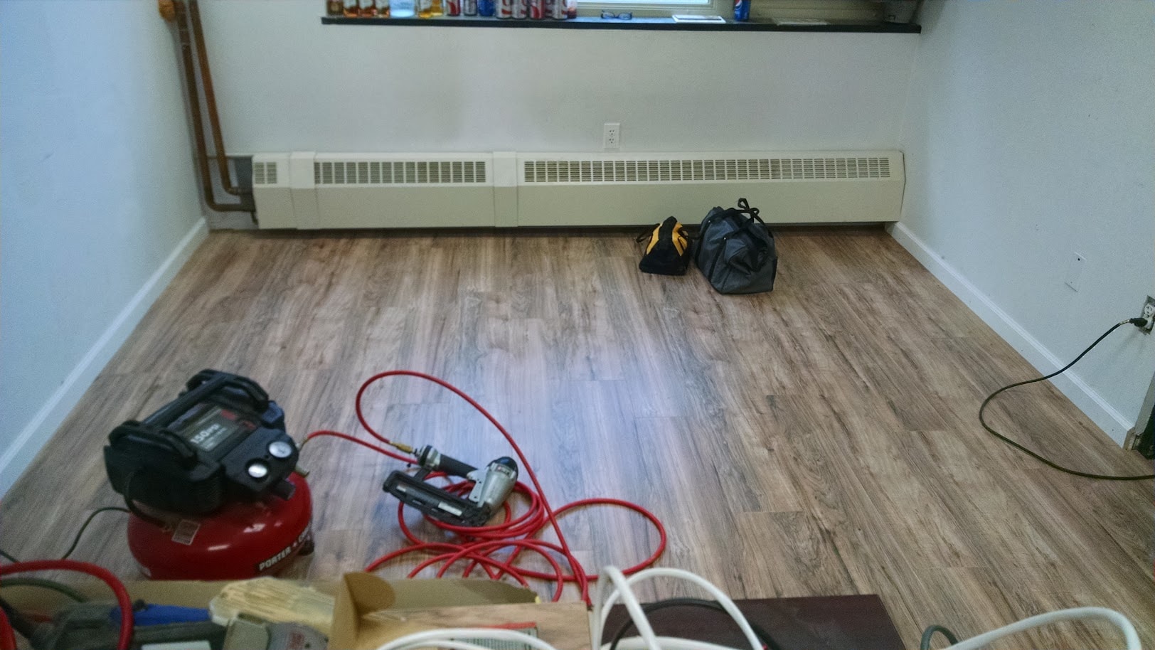 Penn Hills office floor — finished floor with tools